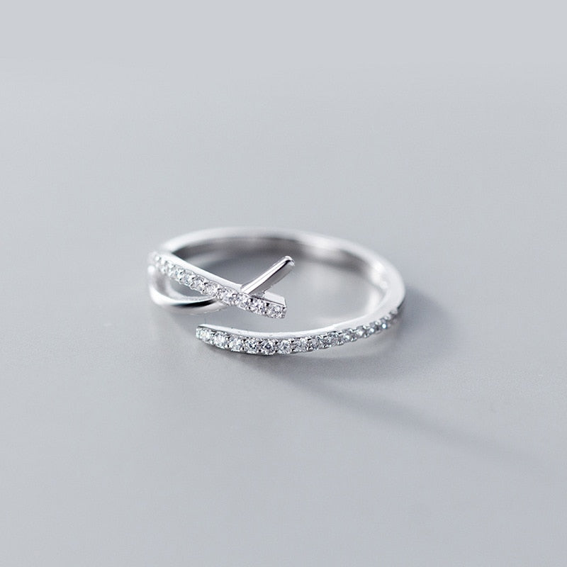 Anello a croce geometrica