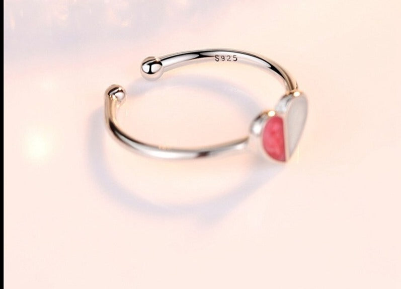 Anello da donna a fascia regolabile a mezzo cuore