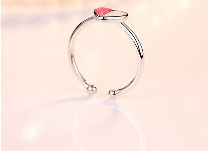 Anello da donna a fascia regolabile a mezzo cuore