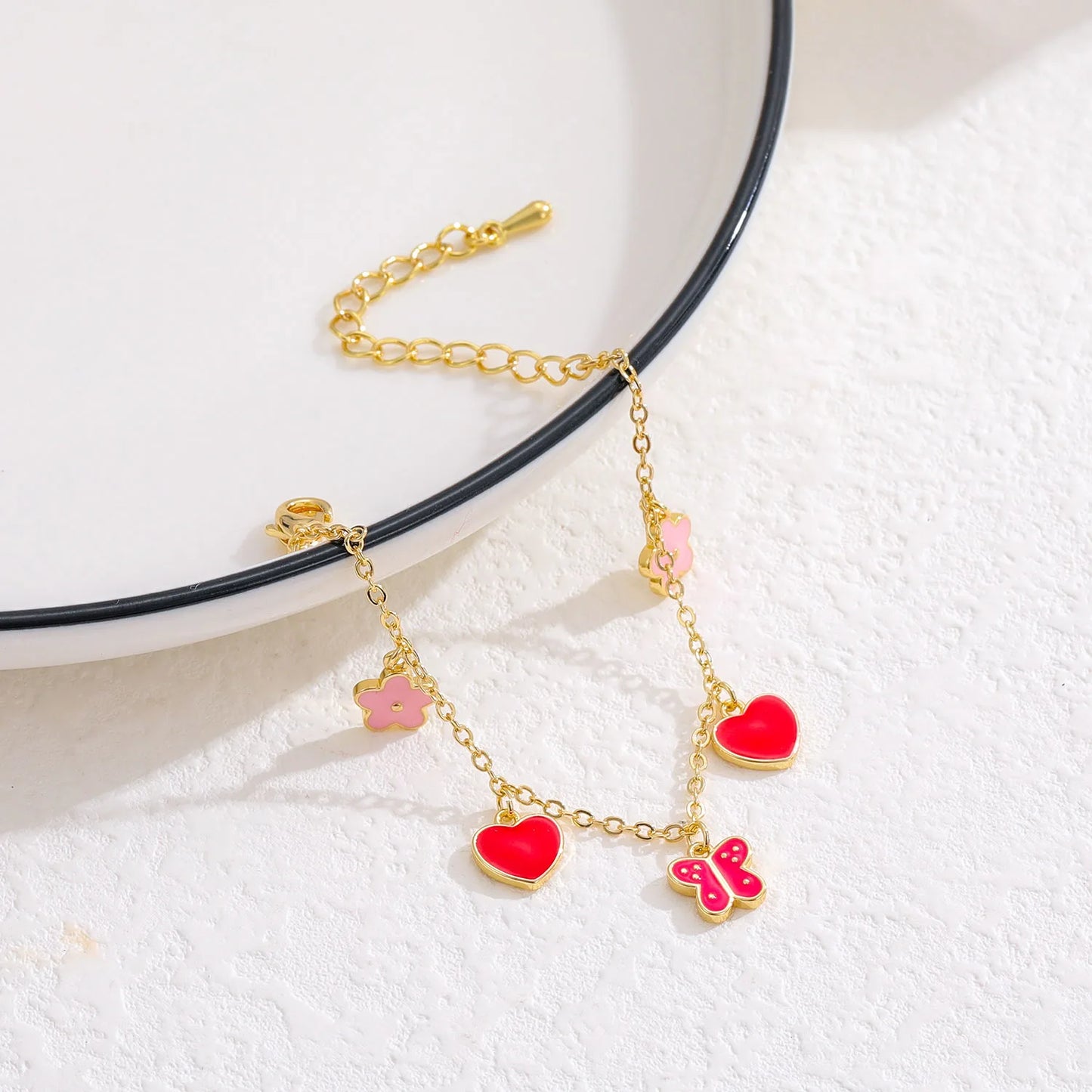 Bracciale regolabile cuore farfalla