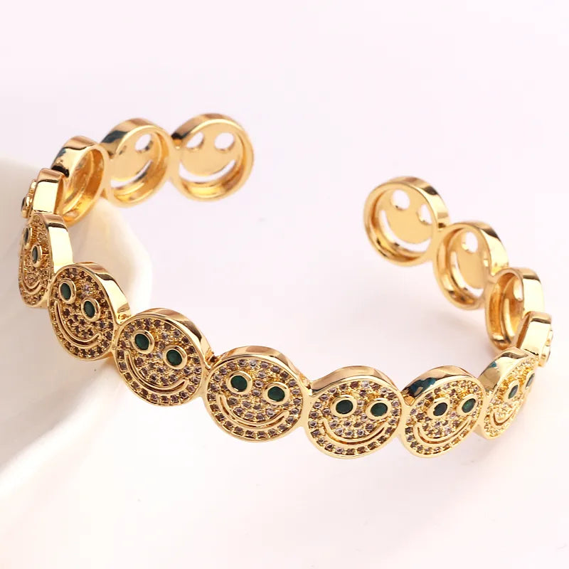 Bracciale Smiley Bracciale con sorriso tondo in rame placcato oro con zirconi