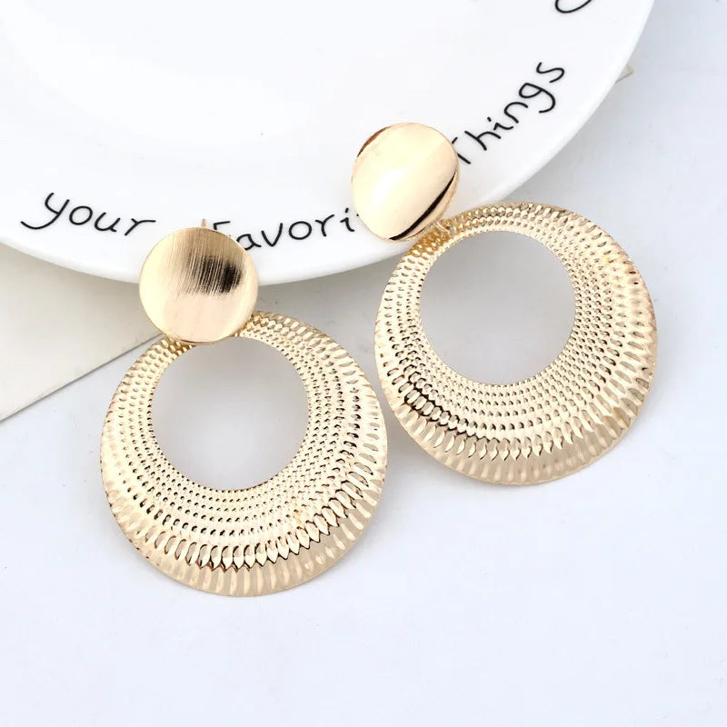 Boucles d'oreilles rondes géométriques